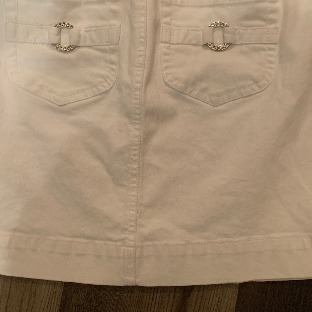 WHBM white denim rhinestone pocket mini skirt. Worn about 2x